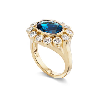 One-of-a-Kind Wildflower Ring with East-West Oval Blue Topaz and Diamond Petals