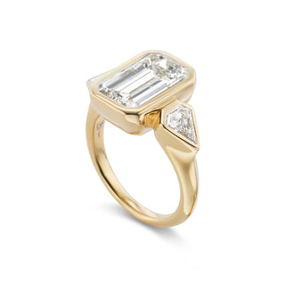 One-of-a-Kind Bezel Ring with North-South Emerald-Cut Diamond and Diamond Shield Sides