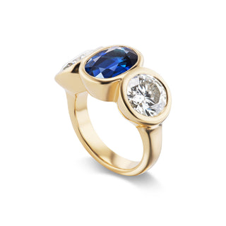 One-of-a-Kind BNS Ring with Oval Blue Sapphire and Round Diamond Sides